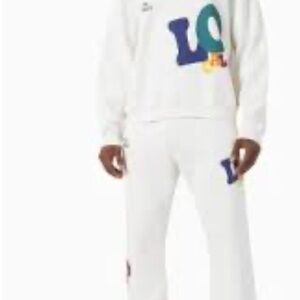 Madhappy Cream Apparel with Black Logo